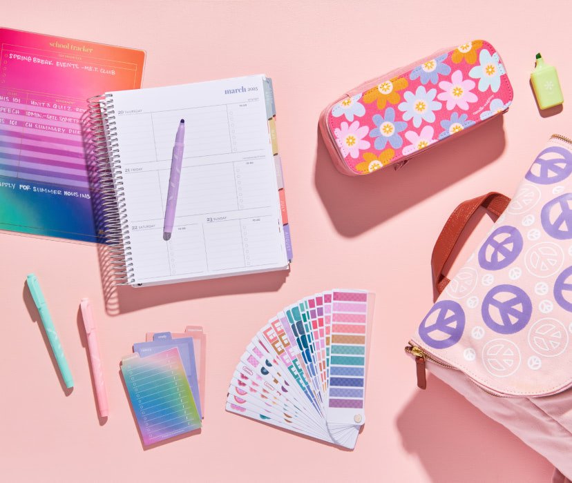 overhead view of assorted planners and accessories for back to school