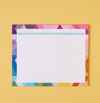 Mousepad notepad featuring geometric multicolored design on a bright yellow background. Click to shop Mouse Pad Notepads.