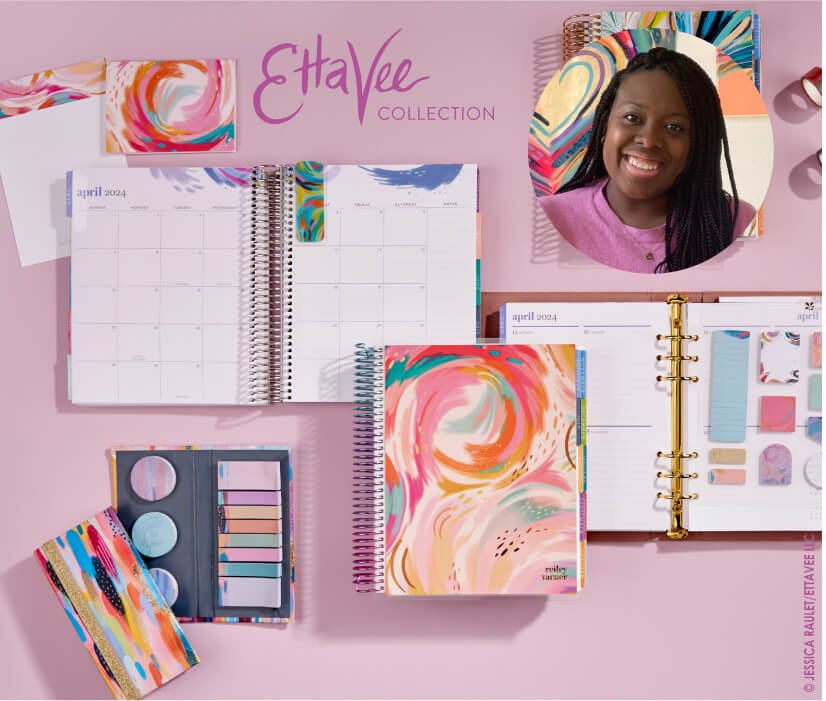 overhead view of assorted planners and accessories featuring EttaVee designs