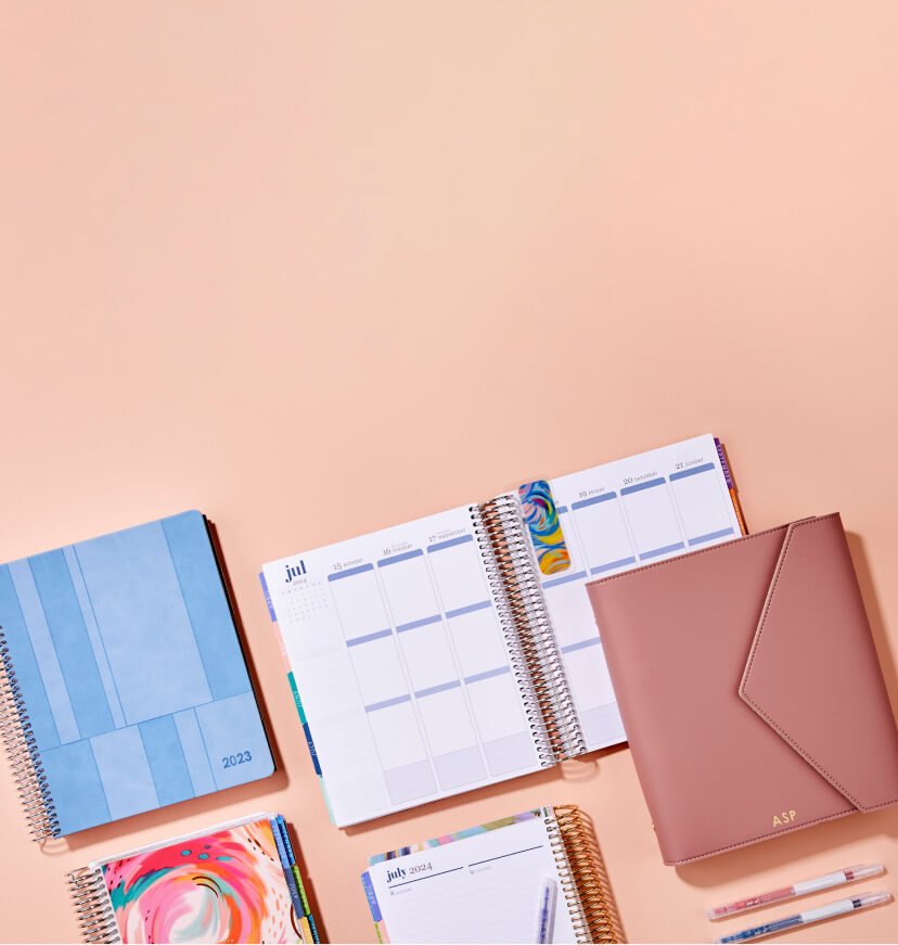 overhead view of assorted planners and accessories