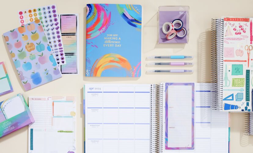 overhead view of assorted teacher planners and accessories