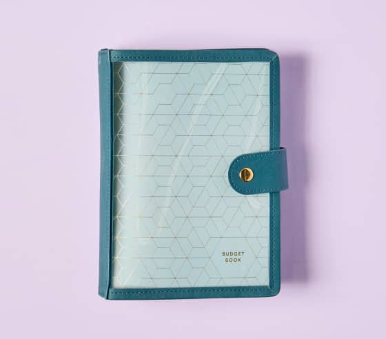 Petite Planners inside a dark blue clear folio. Click to shop Folio System.