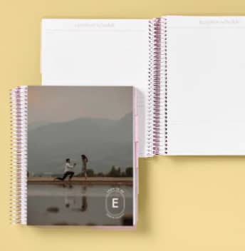 An open planner showing a wedding mood board layout