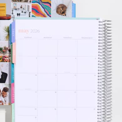 coiled monthly planner showing monthly layout. click to shop now.
