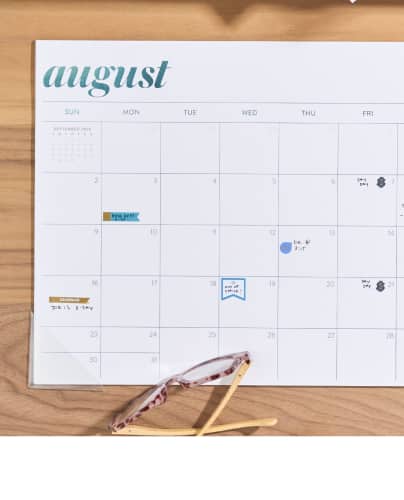 monthly calenfar deskpad featuring August 2026 calendar.
