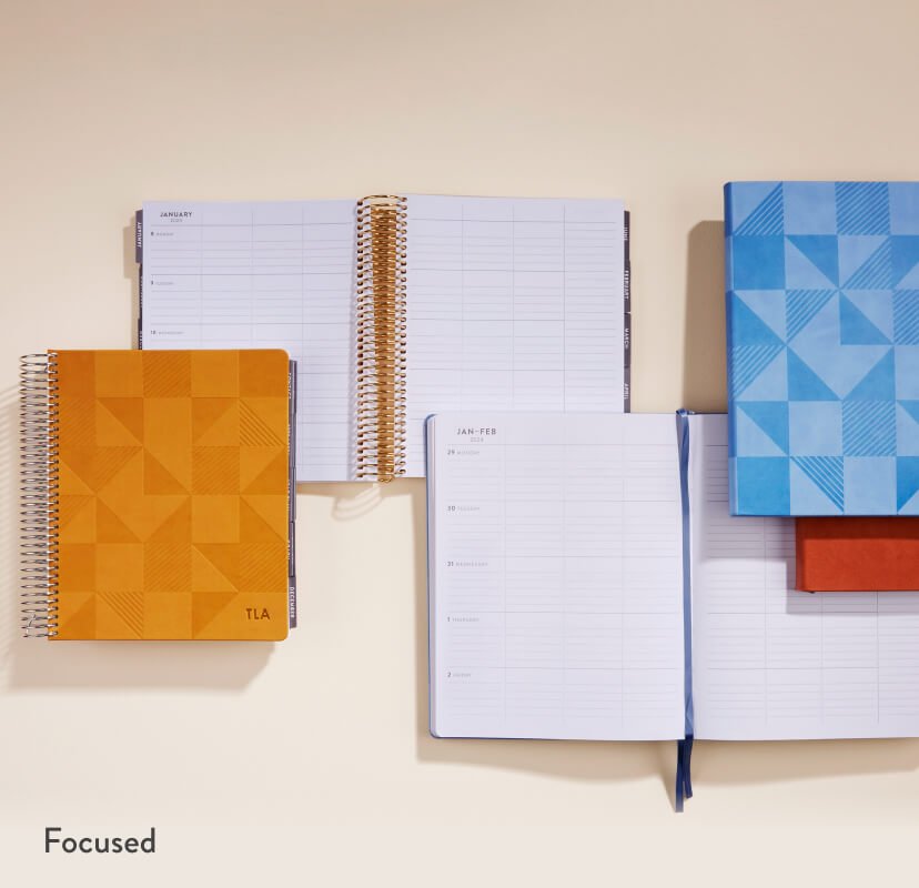 overhead view of assorted Focused teacher lesson planners