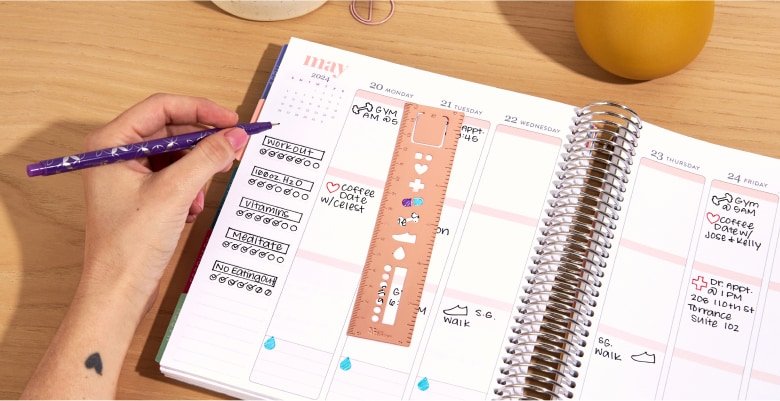Open lifeplanner with notes and ruler showing