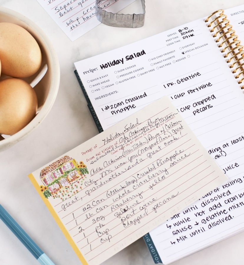 Overhead view of recipe notebook and recipe card.
