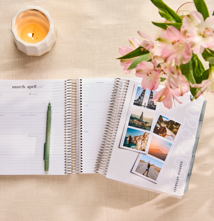 Coiled guided journals and notebooks on a table.