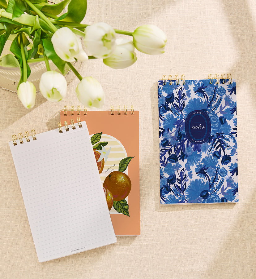 Beautifully organize your day. Notepads & Deskpads! Click to shop now!