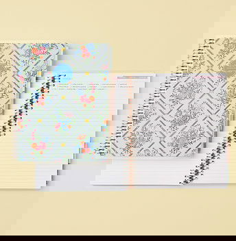 coiled recipe planner featuring florals. Click to shop meal prep planners and notebooks.