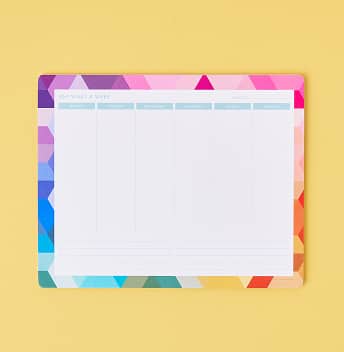 Mousepad notepad featuring geometric multicolored design on a bright yellow background. Click to shop Mouse Pad Notepads.